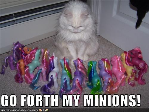 funny-pictures-cat-has-toy-pony-minions.jpg